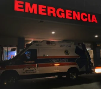 Ambulance parked outside emergency entrance at night | Associated Nephrology Consultants | Maplewood MN
