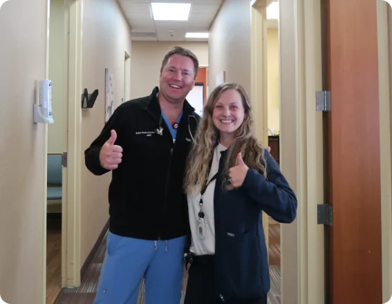 Happy staff members in hallway of kidney care clinic Maplewood MN